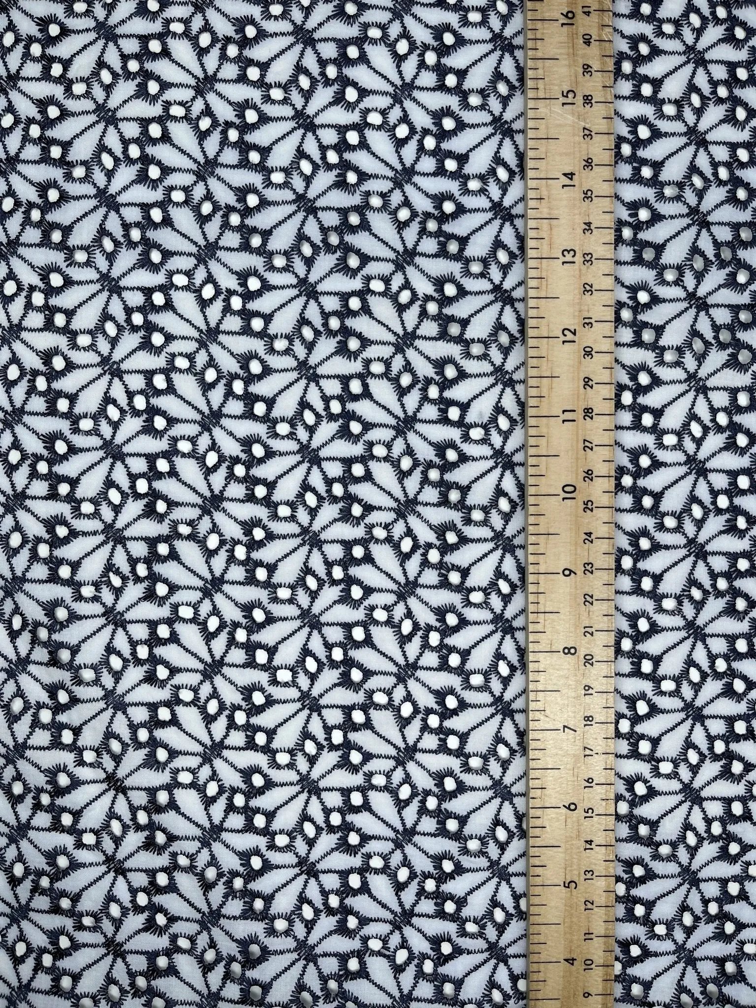 Eyelet cotton embroidered fabric