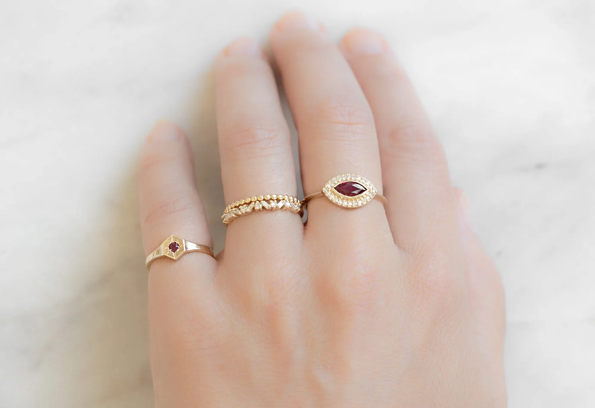 The Dahlia Ring with a Ruby Marquise