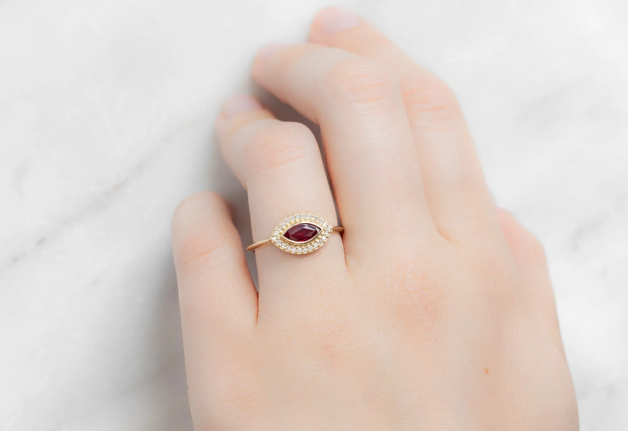 The Dahlia Ring with a Ruby Marquise