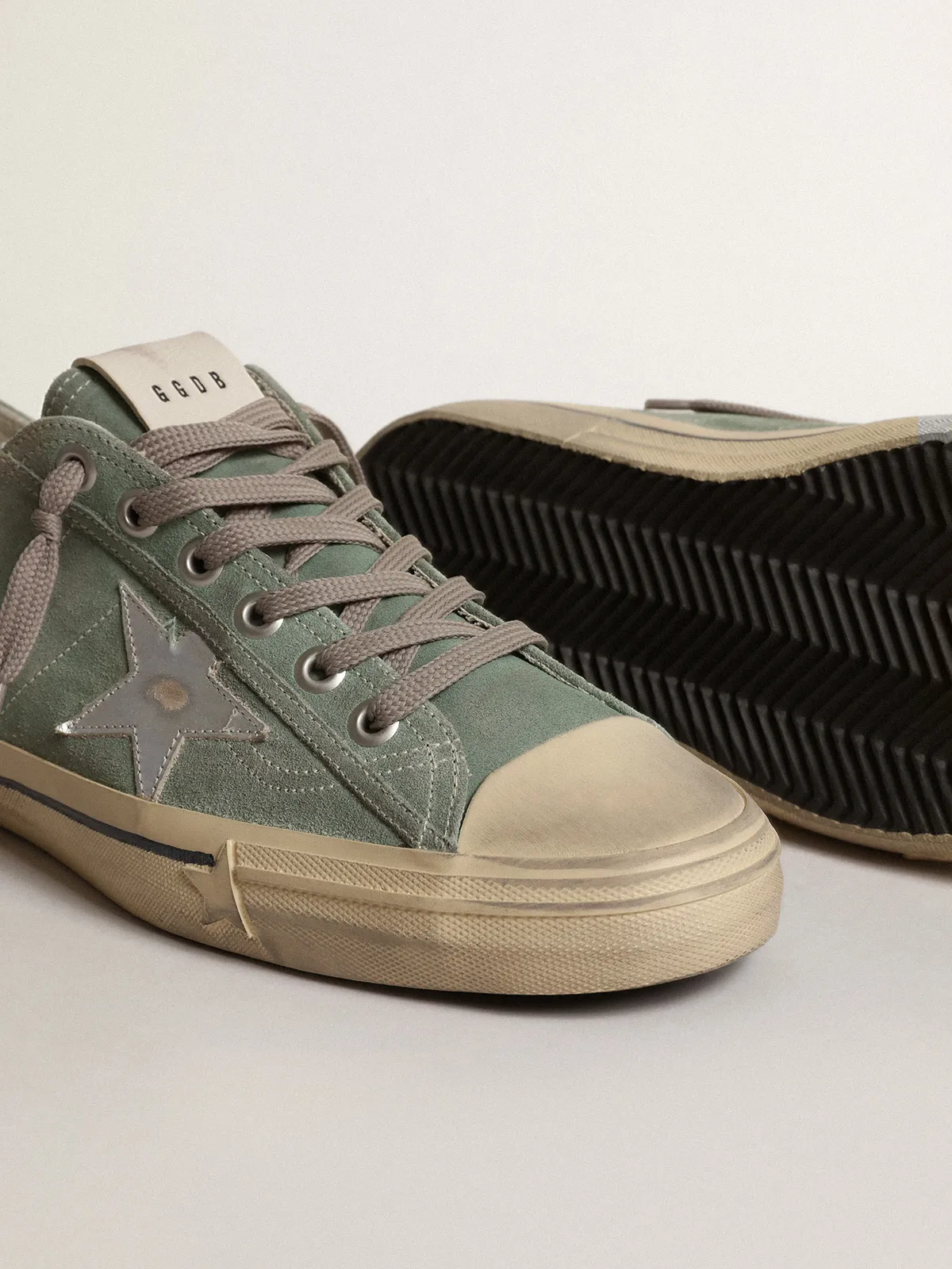 V-Star in military-green suede with a laminated leather star