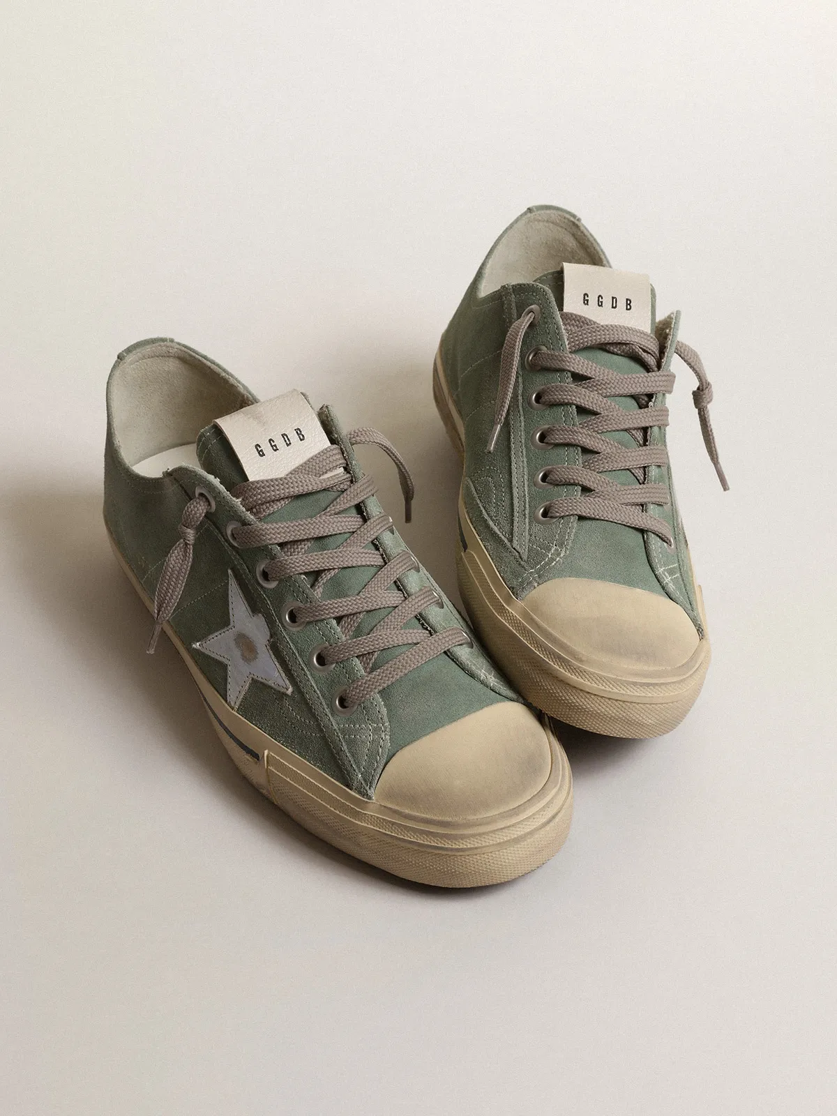 V-Star in military-green suede with a laminated leather star